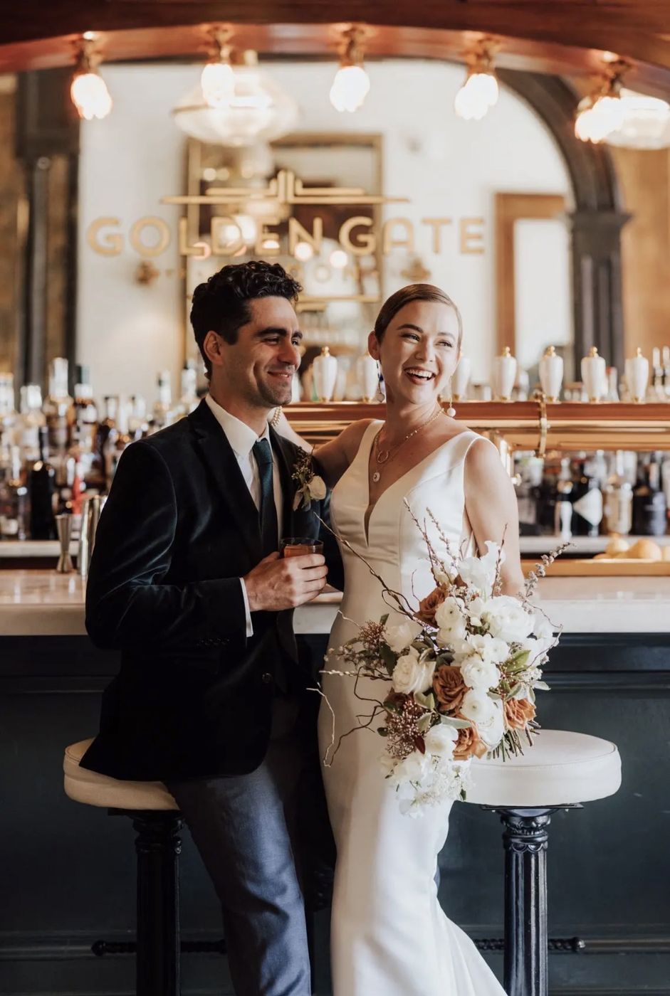 A couple with drinks at the Golden Gate Saloon bar